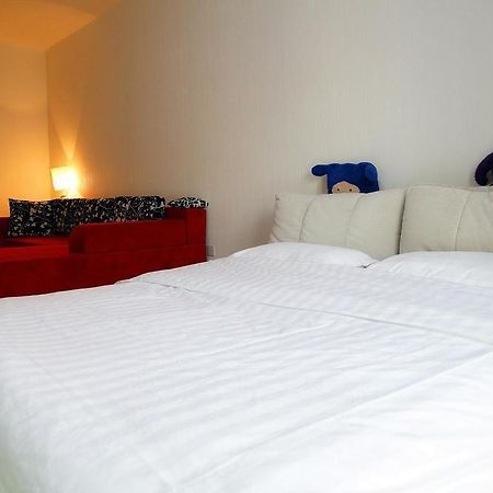 Mini Impression Hotel Xinghaitun Buitenkant foto