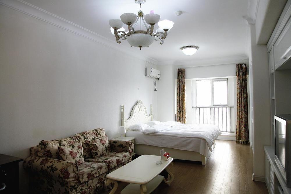 Mini Impression Hotel Xinghaitun Buitenkant foto
