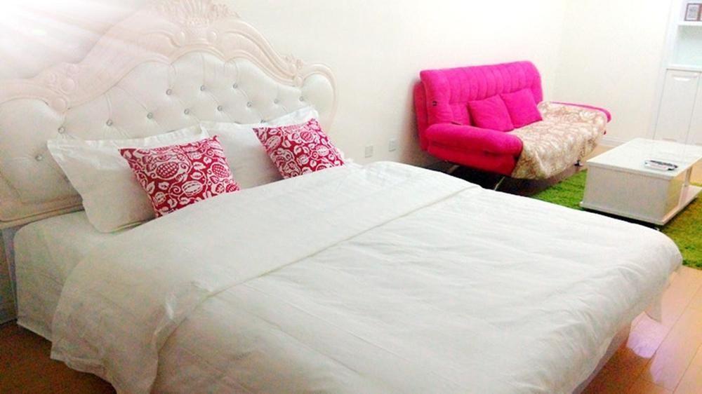 Mini Impression Hotel Xinghaitun Buitenkant foto